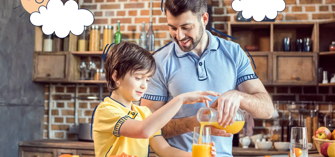 Padre e hijo haciendo jugo de naranja