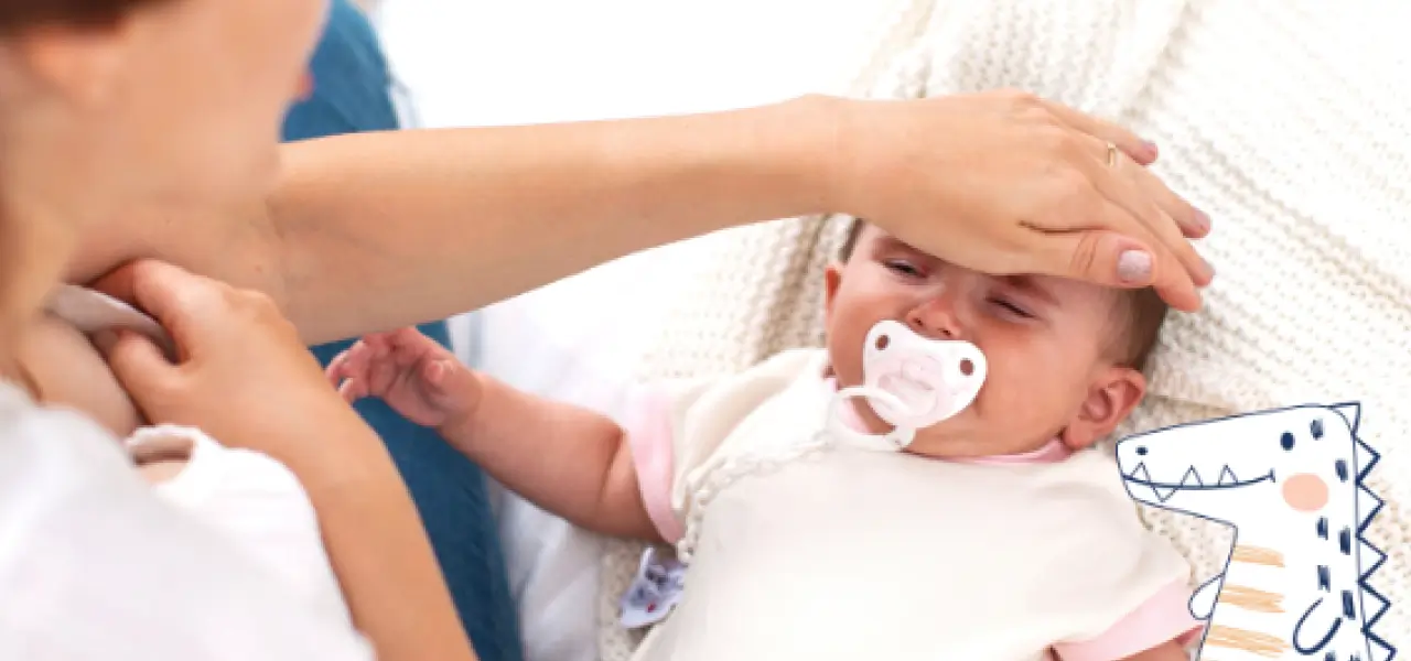 Mamá revisando la temperatura de su bebé