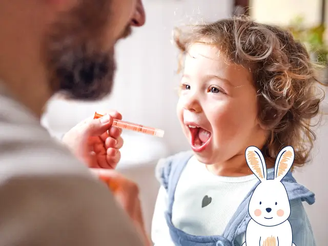 Niña tomando el medicamento